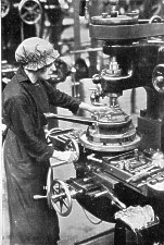 Girl Operating vertical milling machine on machine tool parts